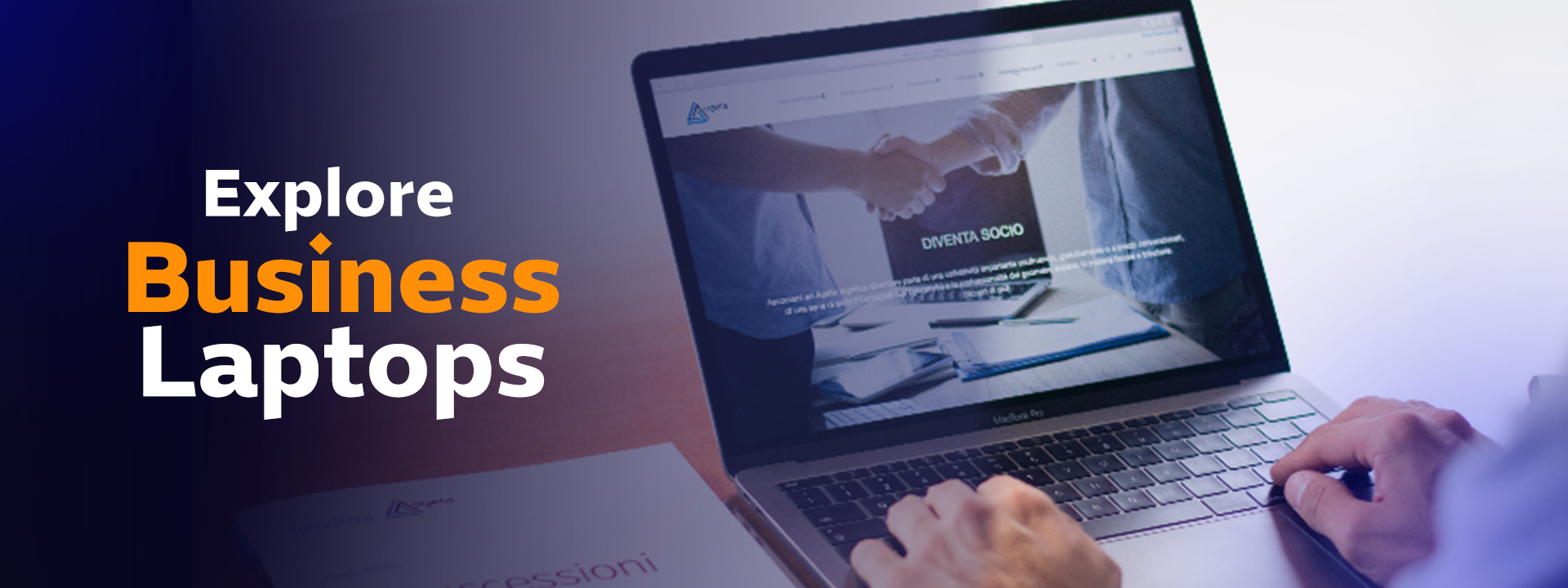 Person using a laptop with a business handshake graphic on the screen, promoting business laptops.